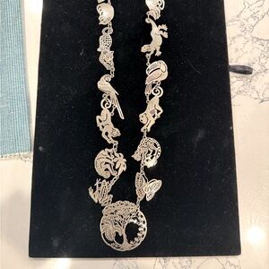 Vintage silver plate animal 13” necklace. GUC